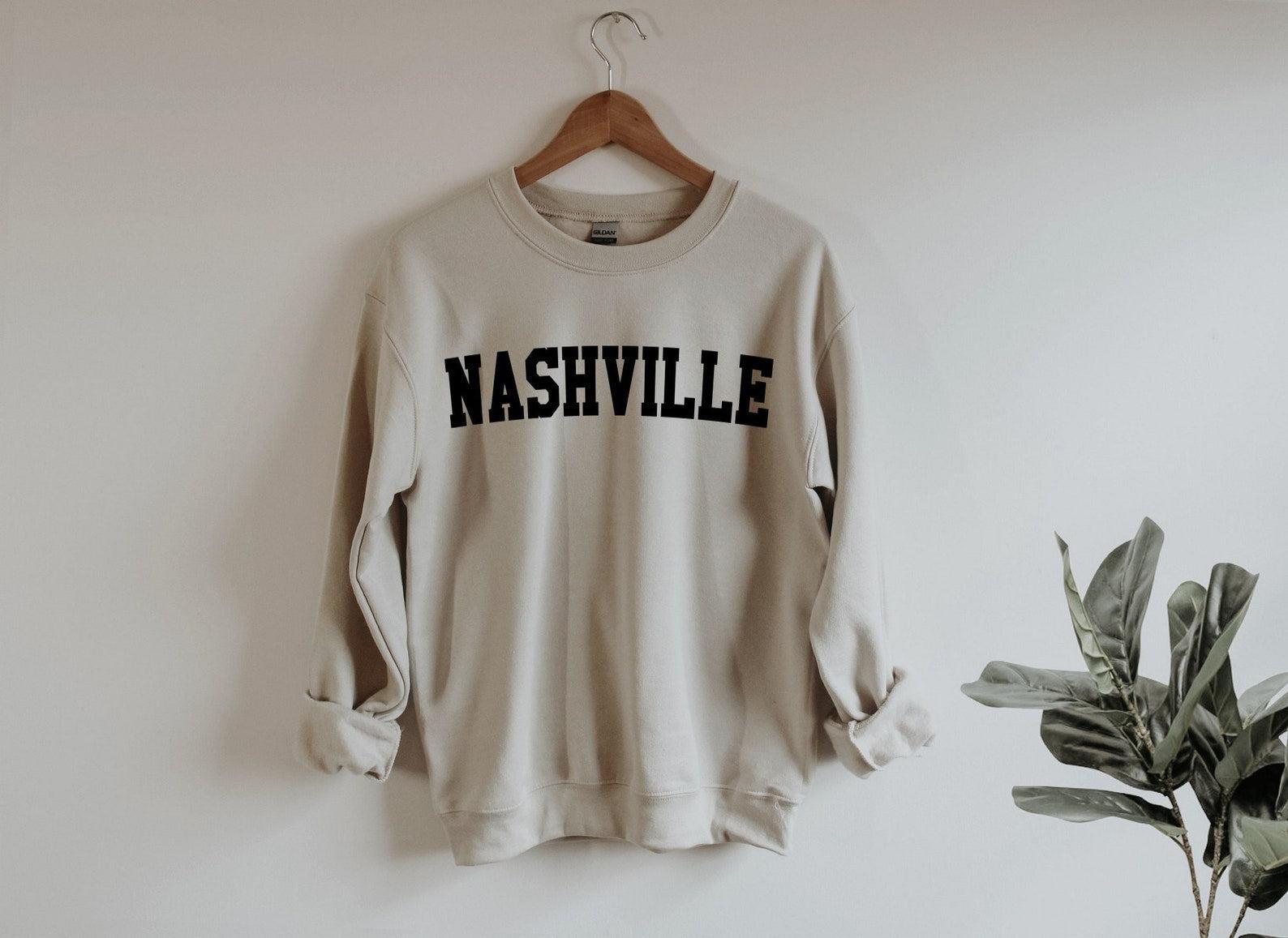 Matching family graphic crewneck sweatshirts in coordinated cozy designs for holiday events and family celebrations
