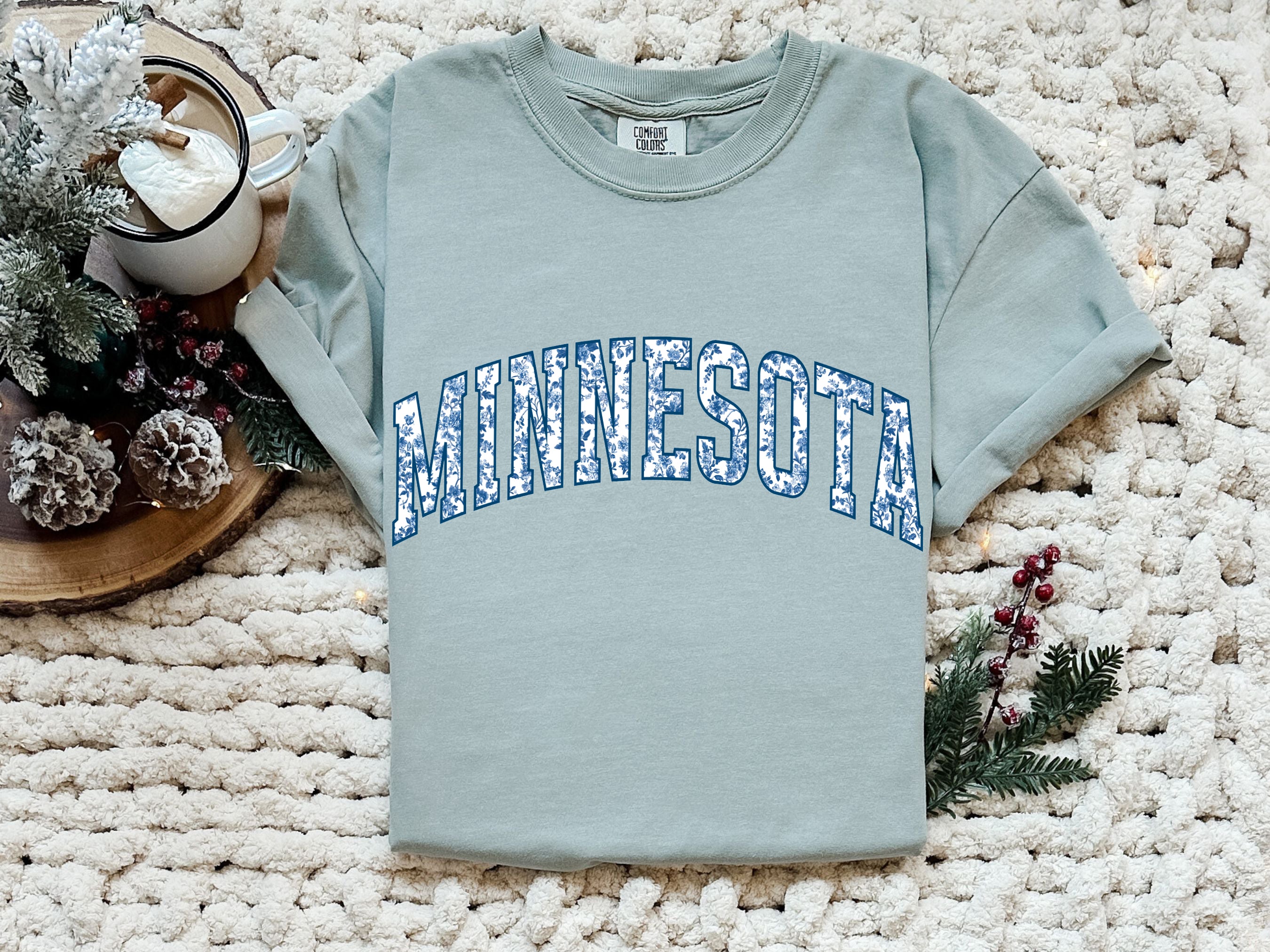 Minnesota State City College Comfort Colors T Shirt (Blue flower)