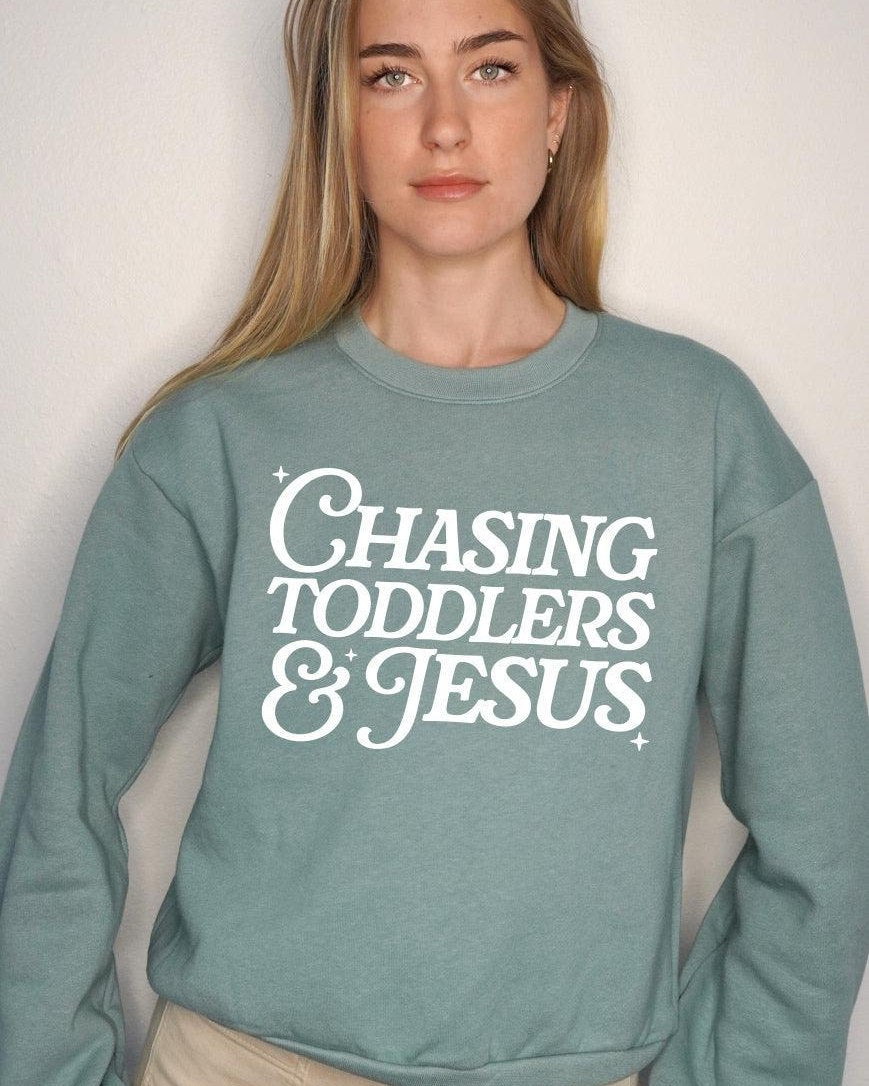 Chasing Toddler and Jesus Christian Mom Faith Bible Women's Slightly Cropped Sweatshirt