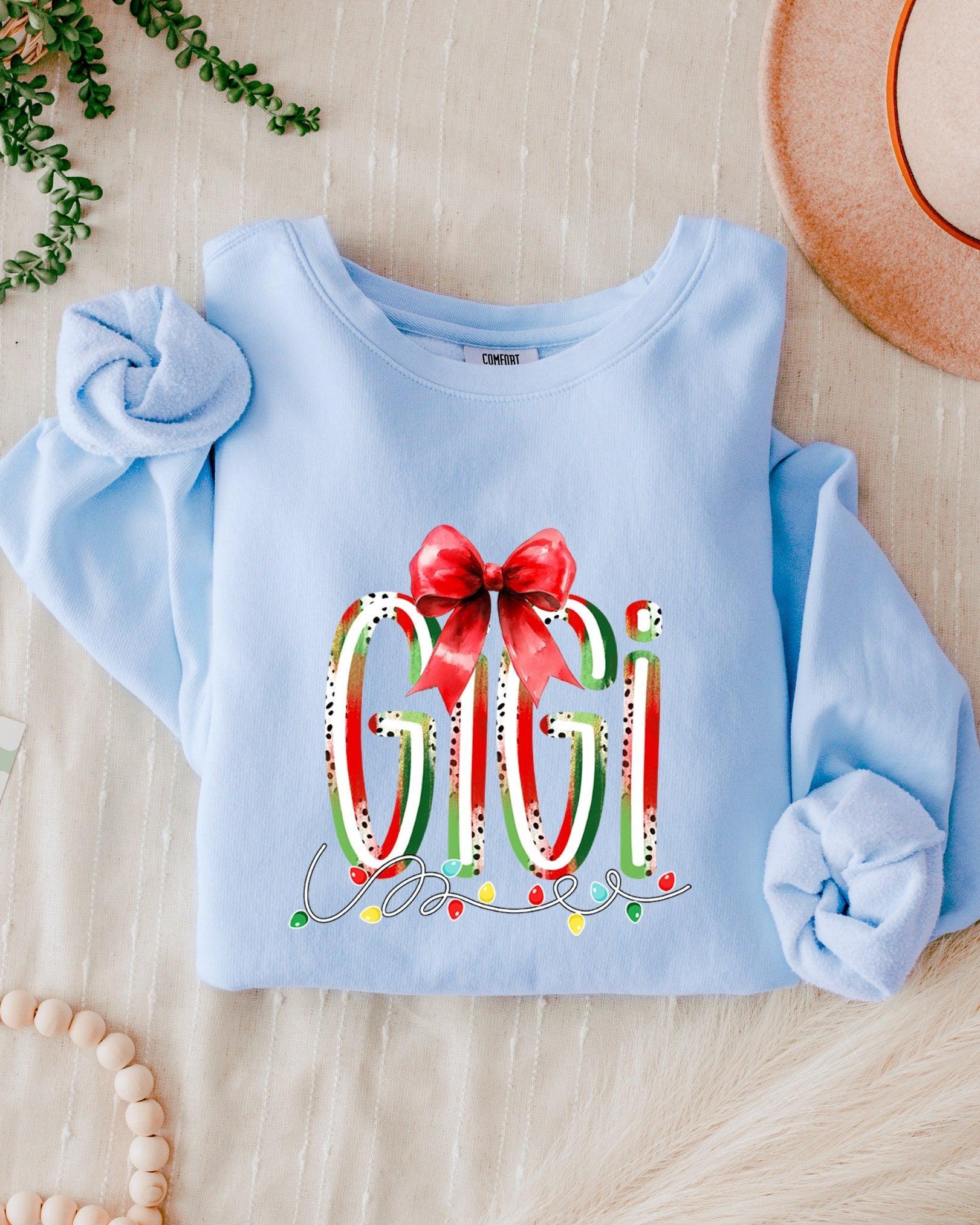 Gigi Christmas Theme Grandma Garment Dyed Comfort Colors Sweatshirt (red ribbon)