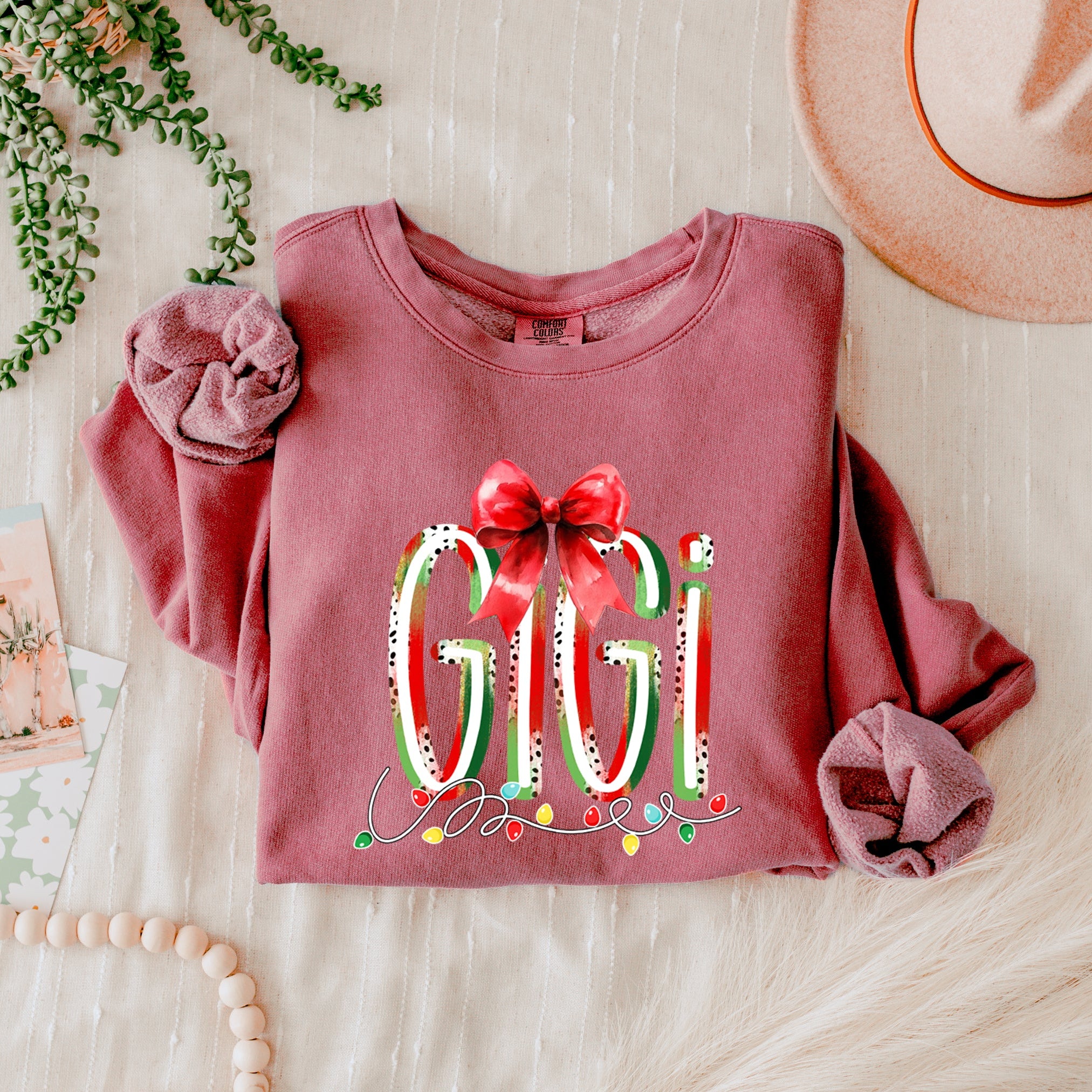 Gigi Christmas Theme Grandma Garment Dyed Comfort Colors Sweatshirt (red ribbon)