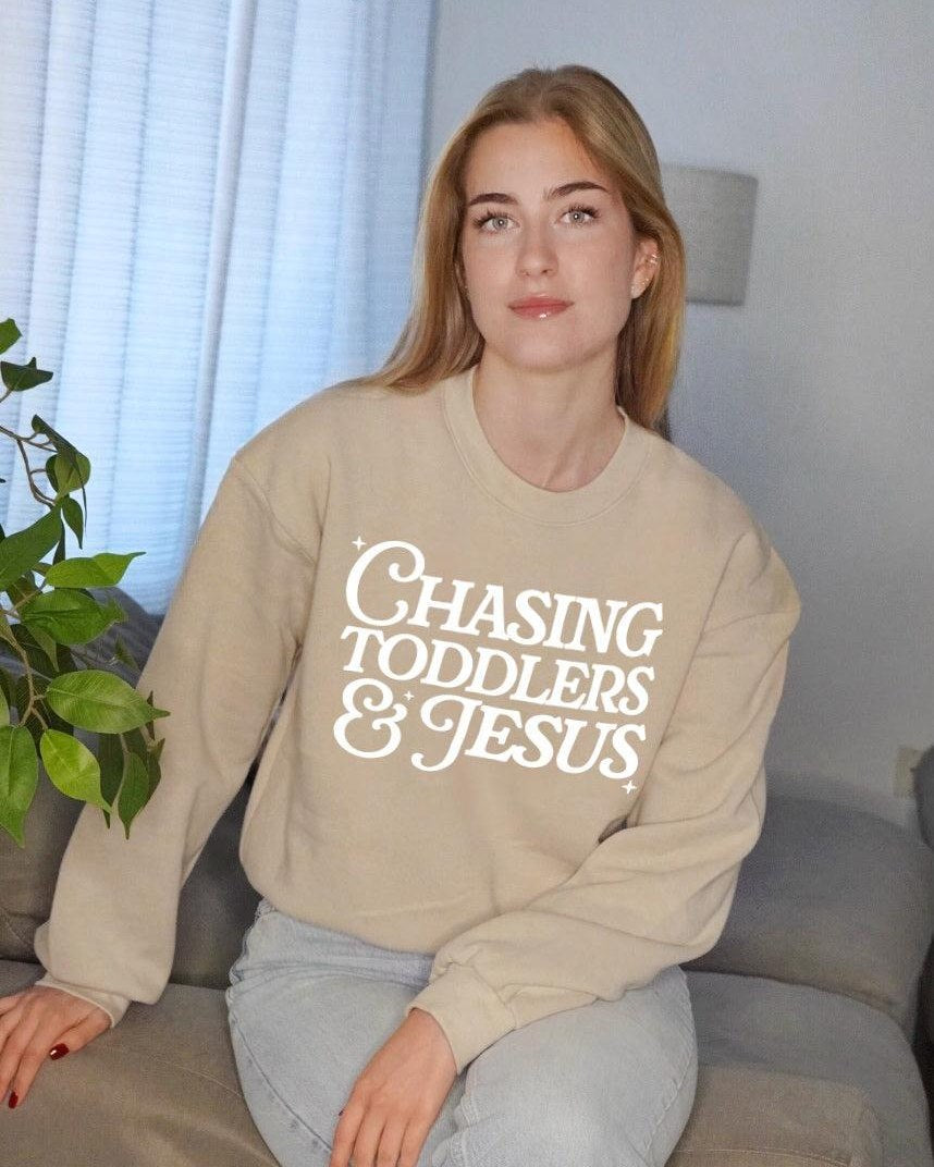 Chasing Toddler and Jesus Christian Mom Faith Bible Women's Slightly Cropped Sweatshirt
