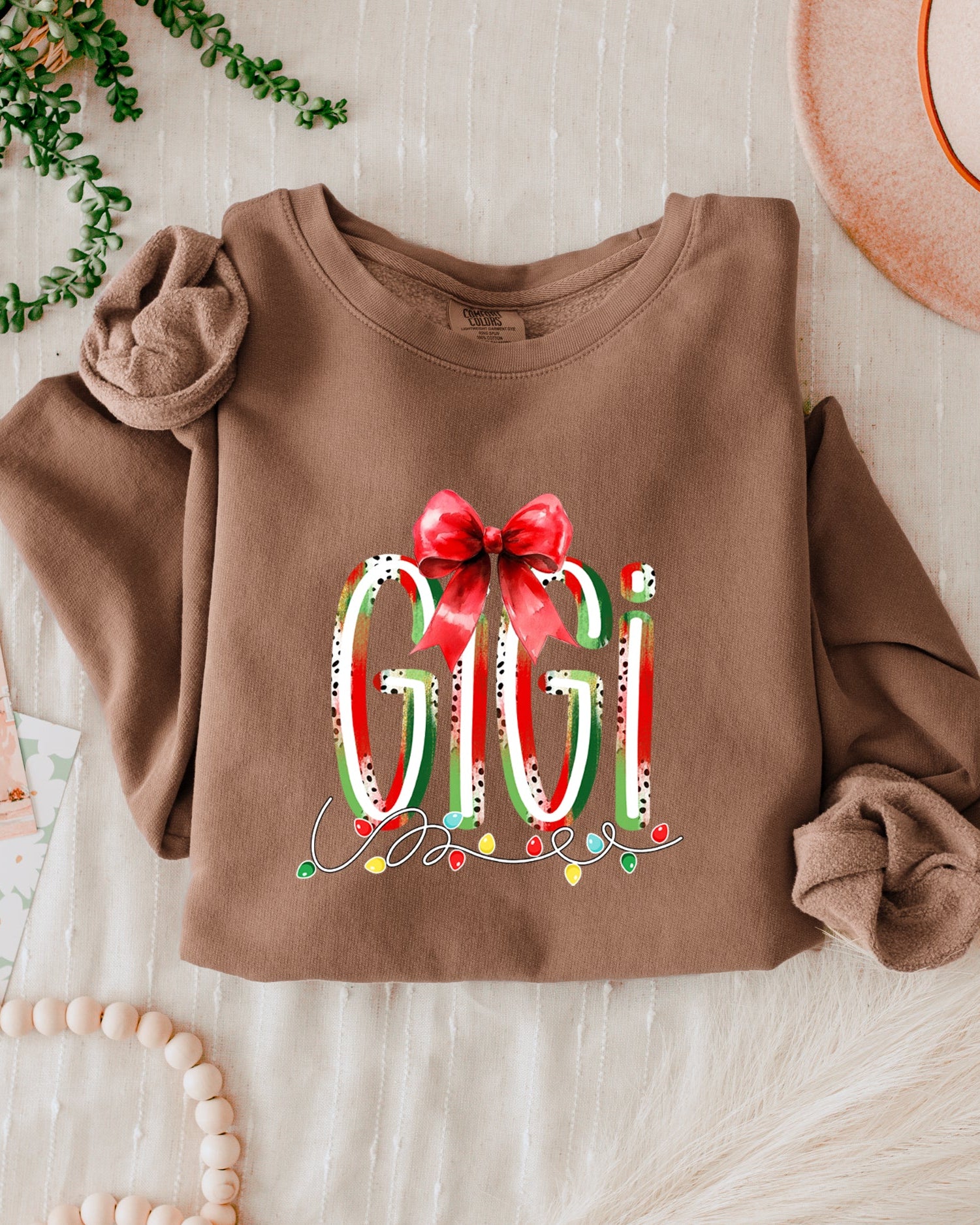 Gigi Christmas Theme Grandma Garment Dyed Comfort Colors Sweatshirt (red ribbon)