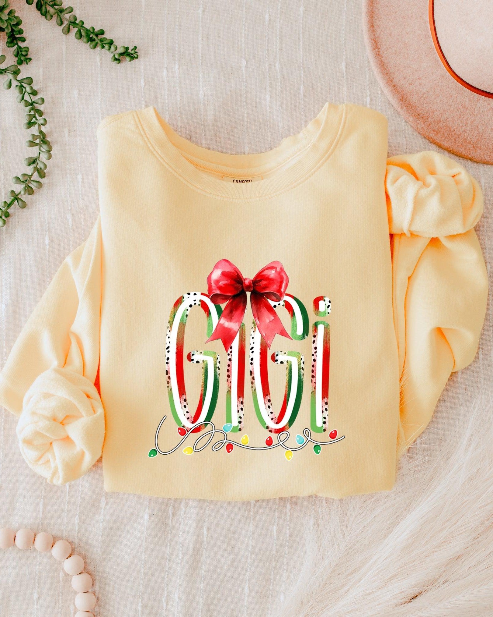 Gigi Christmas Theme Grandma Garment Dyed Comfort Colors Sweatshirt (red ribbon)