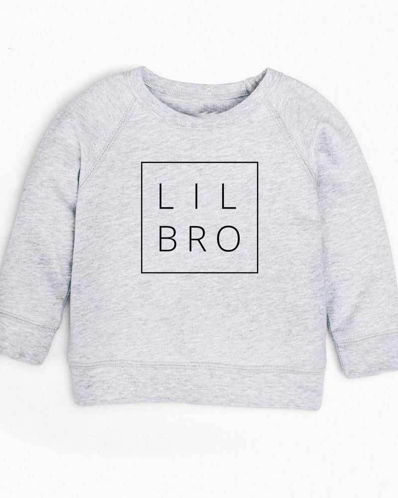 Light grey organic cotton toddler French terry sweatshirt with "LIL BRO" in a black square.